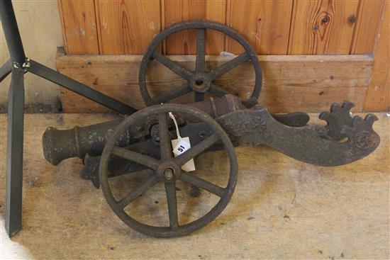 Late 19th / early 20th century cast iron cannon, 18.5in. (length of barrel), overall 26.5in.